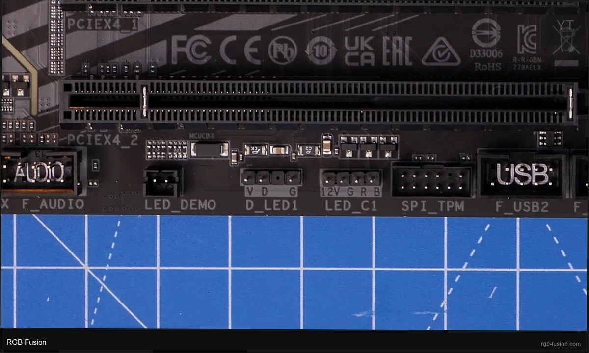 RGB Fusion 2.0 displaying the Cycle effect across a full AORUS Z390 build with motherboard zones, GPU, and RAM all transitioning through the rainbow spectrum in sync